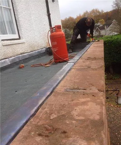 Worker on Roof